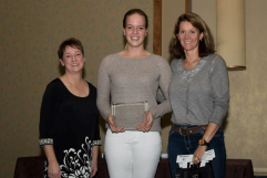 Robin Moore and Michelle Mulcahy present award to Madison Langerak