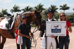  World Equestrian Brands Tack Matters winner Chris von Martels (second from right) and Zilverstar with their groom (left) and Lisa von Martels. 