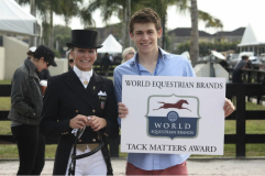 Lisa Wilcox is presented with the World Equestrian Brands Tack Matters Award by Austen Stone