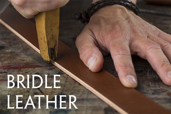 Graphic of man's hands cutting a piece of leather on a table