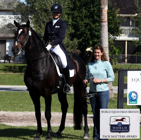 Photo: Ali Brock, a winner of the 2014 Tack Matters award, receiving a Vespucci bridle from Robin Moore, president of World Equestrian Brands.